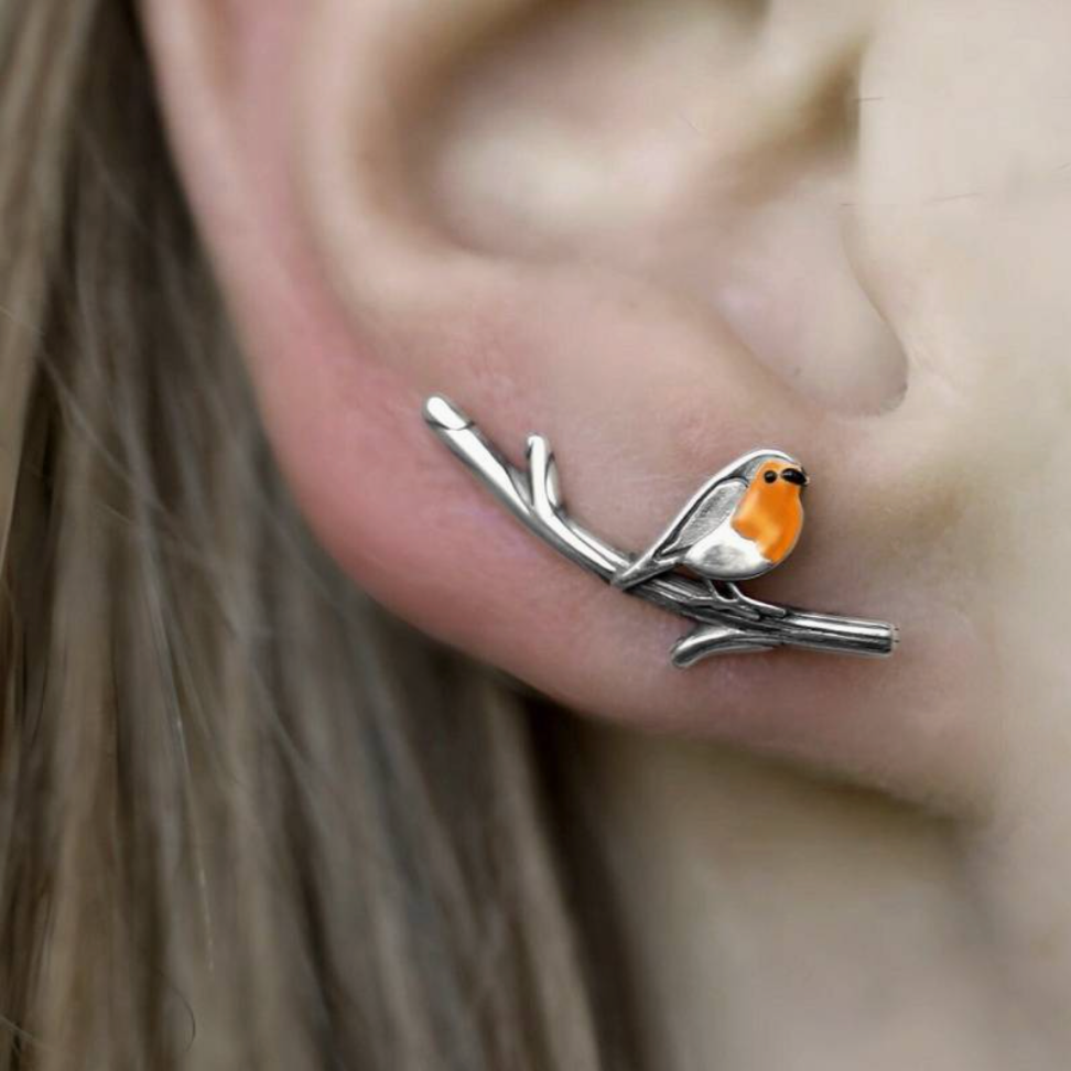 Roodborstje geluksvogel sieradenset. Ketting en oorbellen symboliseren hoop en nieuw begin.