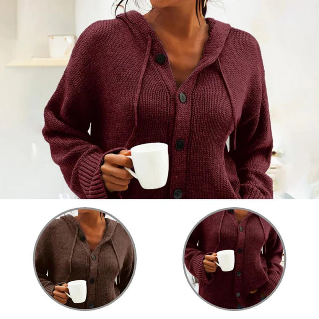 Dames gebreid vest met capuchon in de kleur grijs.