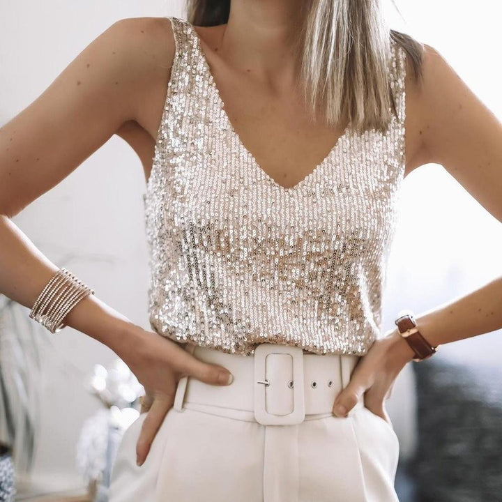 Glamoureus dames pailletten top met sprankelende V-hals, perfect voor elegante gelegenheden en stijlvolle feestavonden.