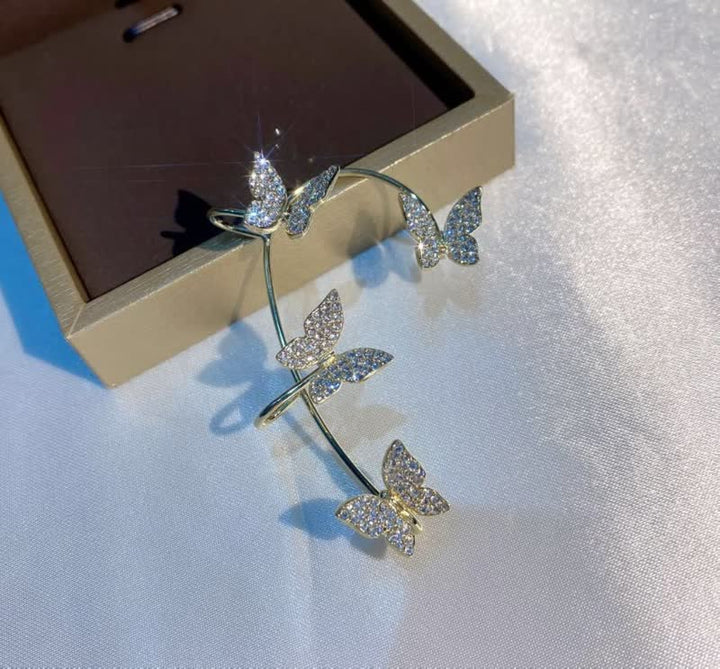 Sprankelende vlinder oorclip, een uniek accessoire voor dames, geen piercing nodig, voor elke outfit.