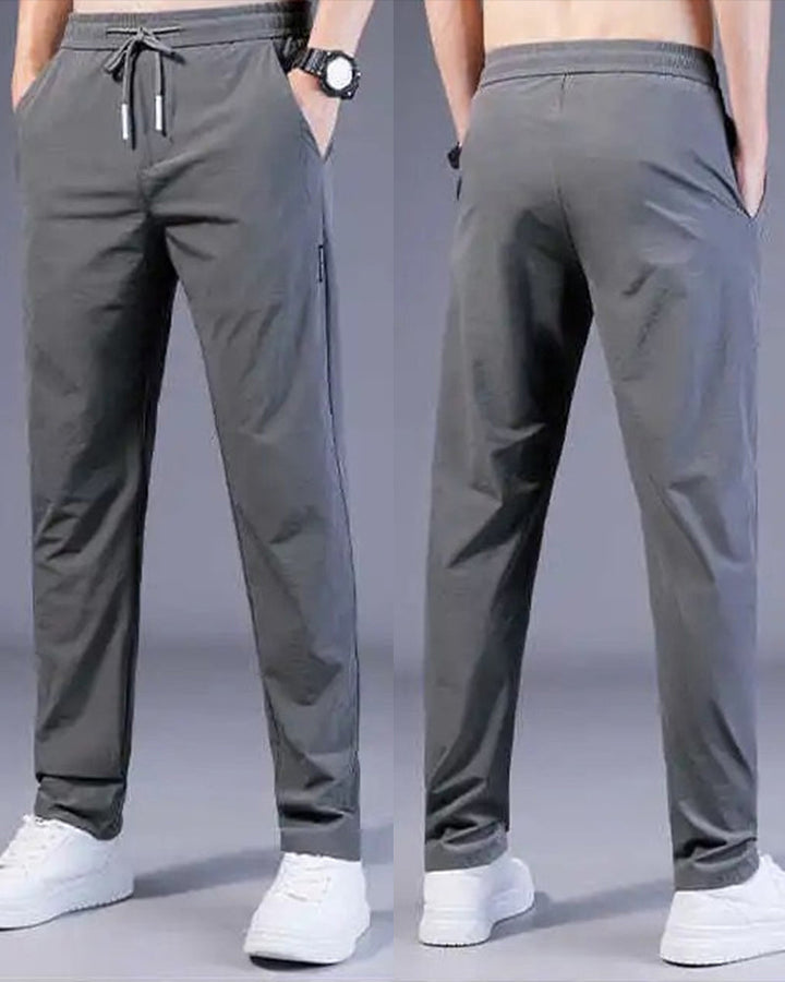 Collectie AeroFlex herenbroeken in grijs, zwart & donkerblauw: sneldrogend, stretch & comfortabel voor elke man.
