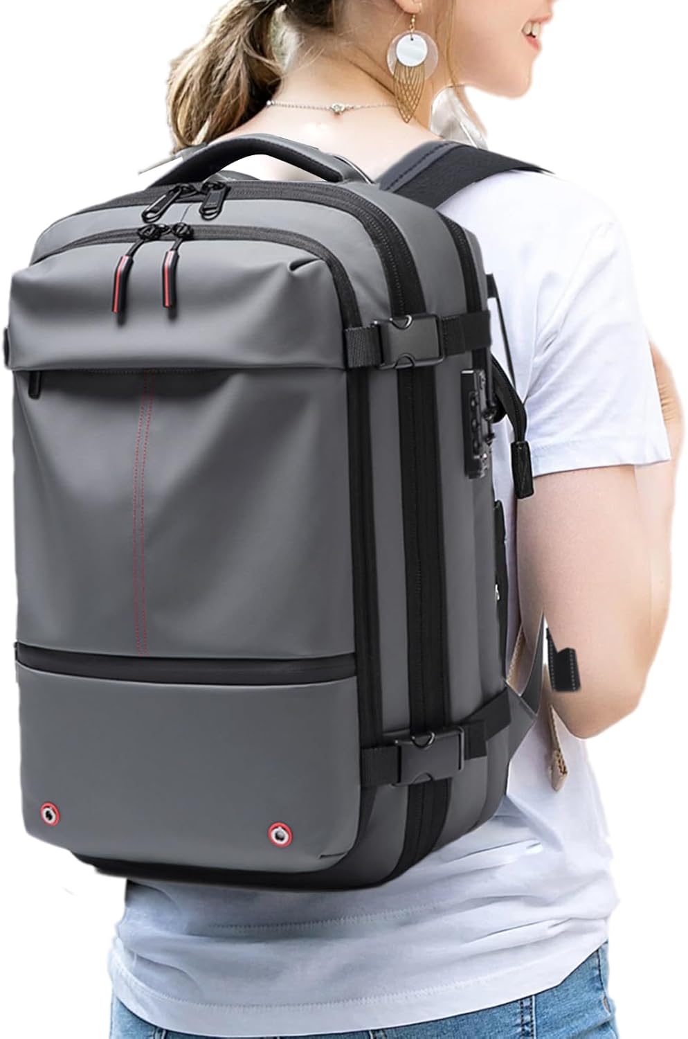 Slimme grijze vacuüm reisrugzak, 60L uitbreidbaar, waterdicht en beschermend laptopvak voor reizigers.