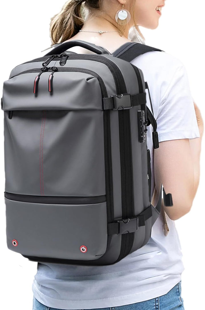 Slimme grijze vacuüm reisrugzak, 60L uitbreidbaar, waterdicht en beschermend laptopvak voor reizigers.