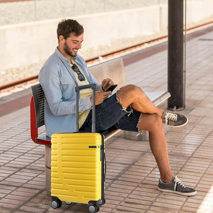 Zwarte uitbreidbare harde handbagage, spinnerwielen, TSA-slot, klaar voor uw volgende vliegreis.