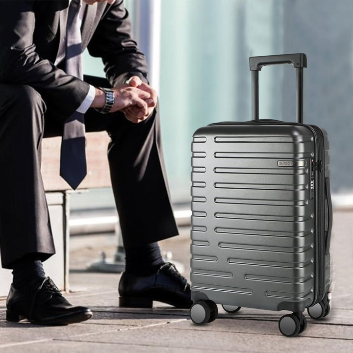 Moderne uitbreidbare handbagage reiskoffer, zwart, met vier dubbele spinnerwielen en TSA-slot.