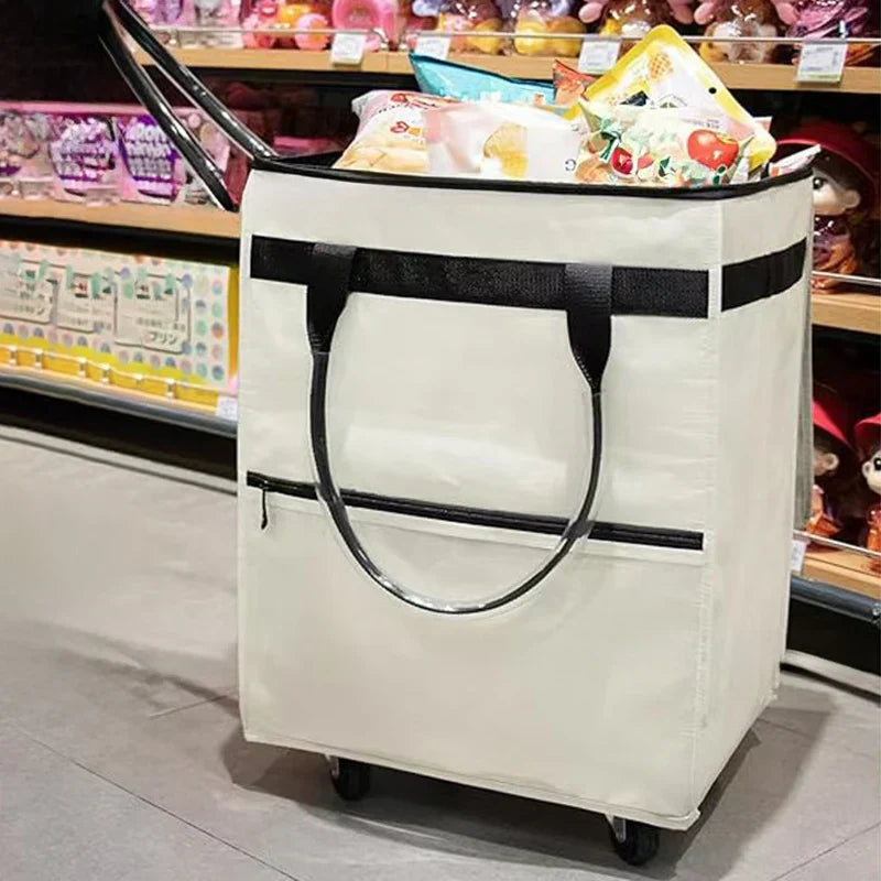 Compacte opgevouwen Rollex boodschappentas met wielen. Ruimtebesparend en makkelijk op te bergen voor reizen.