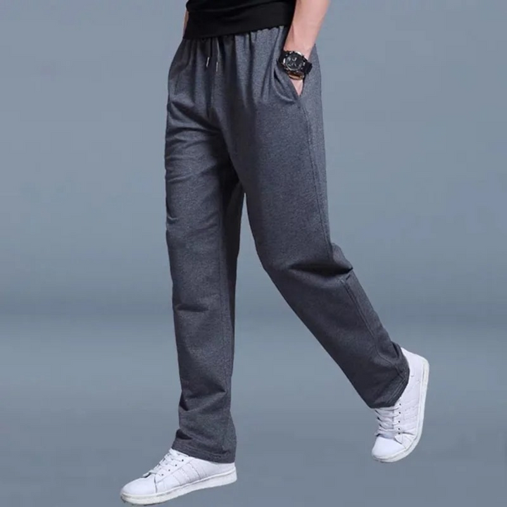 Veelzijdige herenbroek: Comfortabele joggingbroek met trekkoord, wijde pijpen, perfect voor casual look.