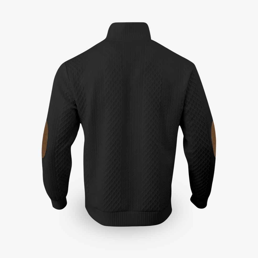 Gebreide luxe herentrui met prominent kabelpatroon en chique elleboogstukken. Perfect voor koude dagen.