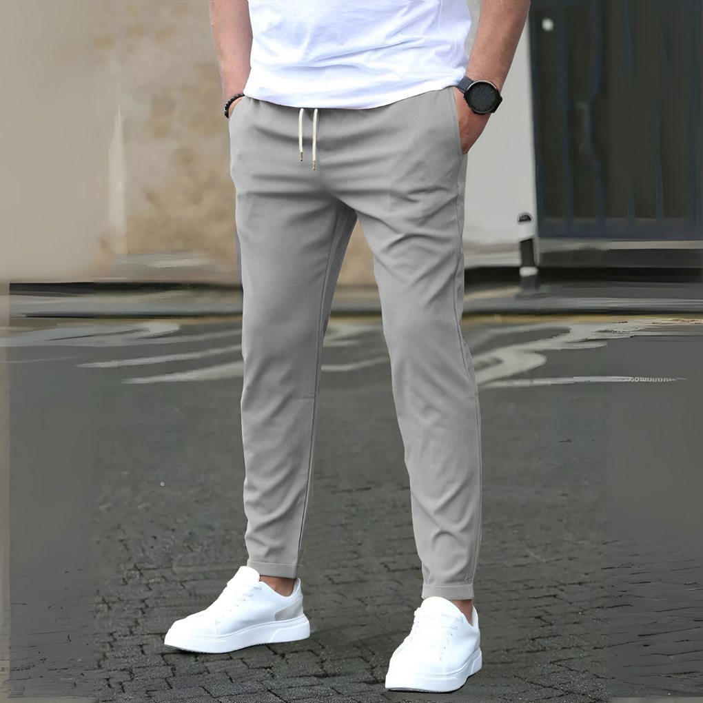 Dagelijkse heren slim fit broek met trekkoord, polyester voor comfort en een moderne casual uitstraling.