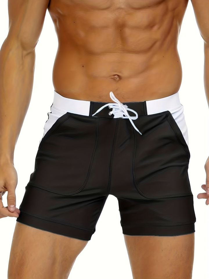 Mannen sneldrogende zwemshort voor actieve zomerdagen. Ademend, modieus en comfortabel voor sportief zwemmen en strand.