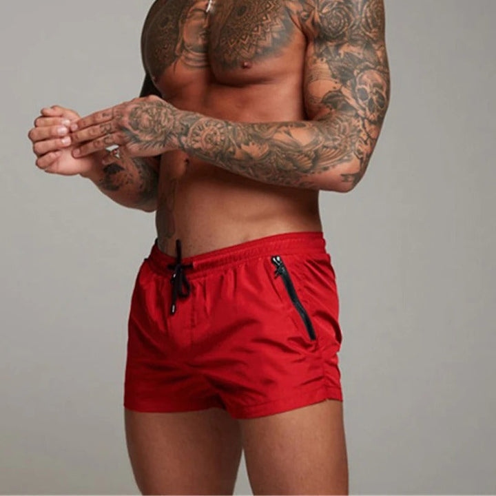 Zomer badmode: heren stretch zwembroek. Comfortabele, flexibele en sneldrogende shorts voor strand en zwemmen.