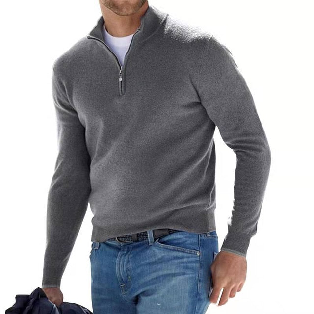 Stijlvolle heren v-hals trui met rits, perfect te combineren met diverse outfits. Comfortabele herenkleding.
