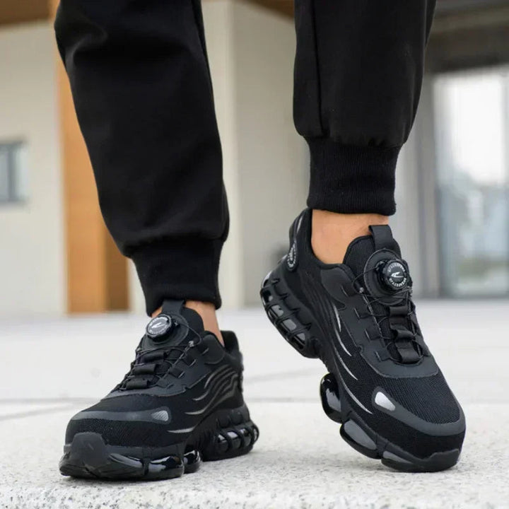 Moderne heren veiligheidssneakers met stalen neus en sportief design, perfect voor professionele werkkleding.