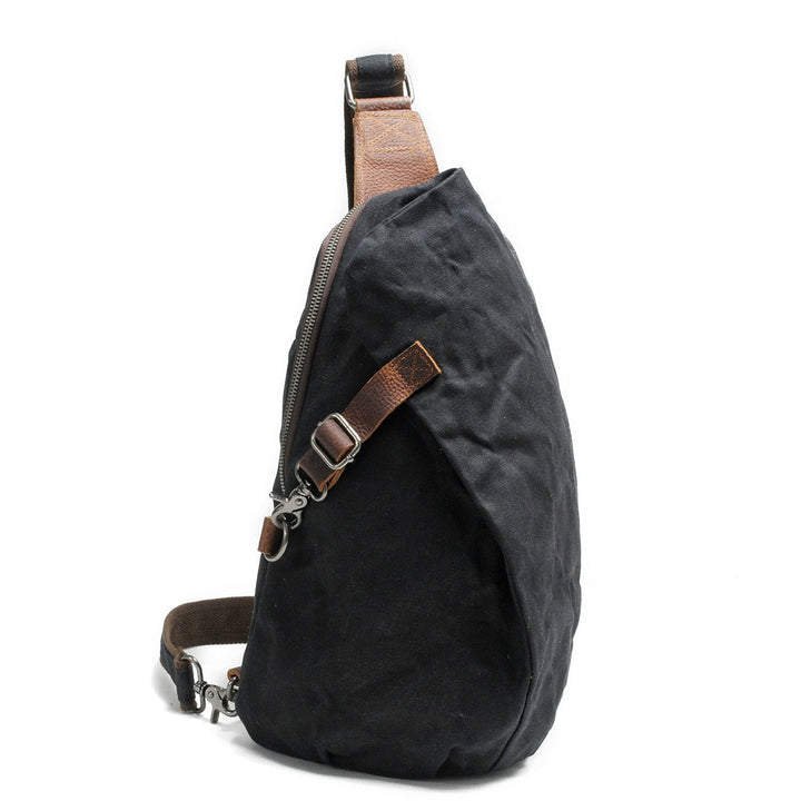 Comfortabele heren waterdichte sling tas van canvas, met verstelbare band en een veilig antidiefstalvak.