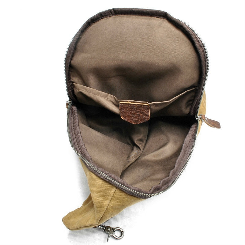 Veilige heren sling tas van waterdicht canvas met verborgen antidiefstalvak voor waardevolle spullen.
