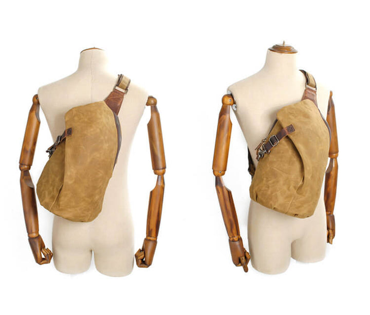 Multiwear heren canvas tas: crossbody, schouder of sling, met waterdichte afwerking en ruime vakken.