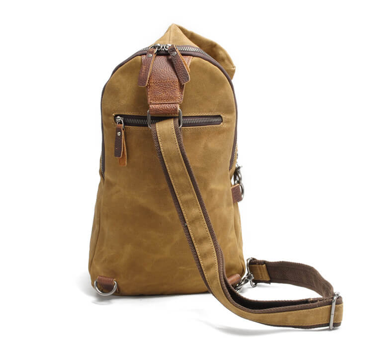 Grijs waterdichte heren canvas sling tas met comfortabele pasvorm en handig antidiefstal ritsvak.