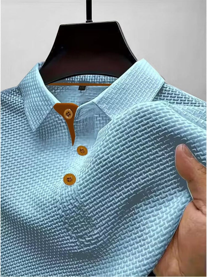 Moderne fit herenpolo in stijlvol gebreid design. Perfecte smart casual herenkleding met korte mouw voor de zomer.