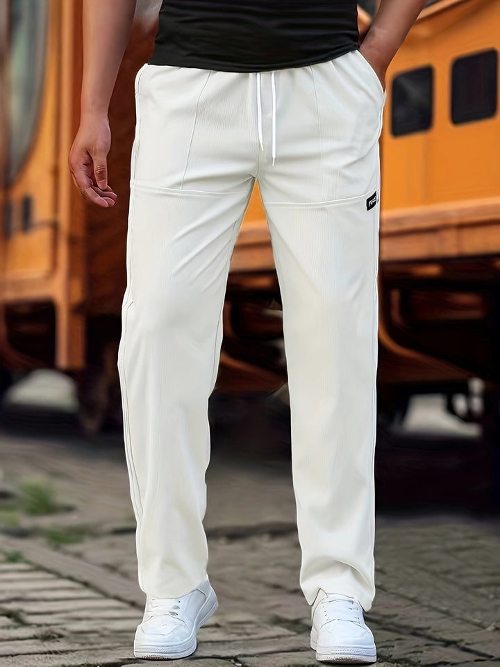 Heren casual broek met jogger design in donkerblauw, stijlvolle snit, comfortabele pasvorm, katoenmix, praktische zakken
