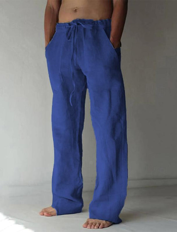 Heren Baggy Broek in Blauw, loszittend, gemaakt van lichte en ademende stof, ideaal voor zomer en vrije tijd.