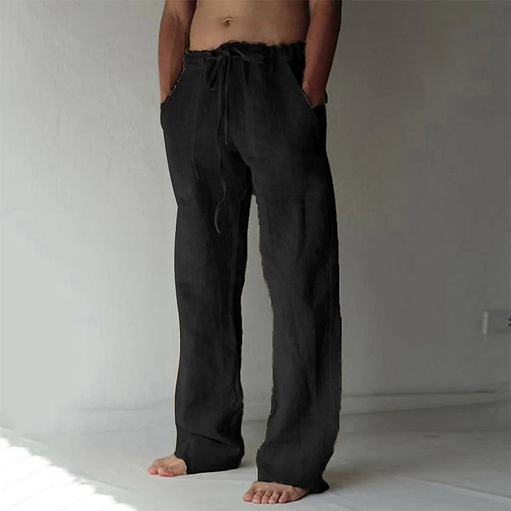 Heren Baggy Broek in Blauw, loszittend, gemaakt van lichte en ademende stof, ideaal voor zomer en vrije tijd.