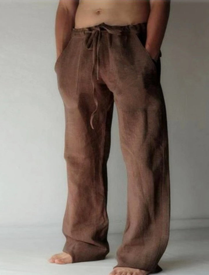 Heren Baggy Broek in Blauw, loszittend, gemaakt van lichte en ademende stof, ideaal voor zomer en vrije tijd.