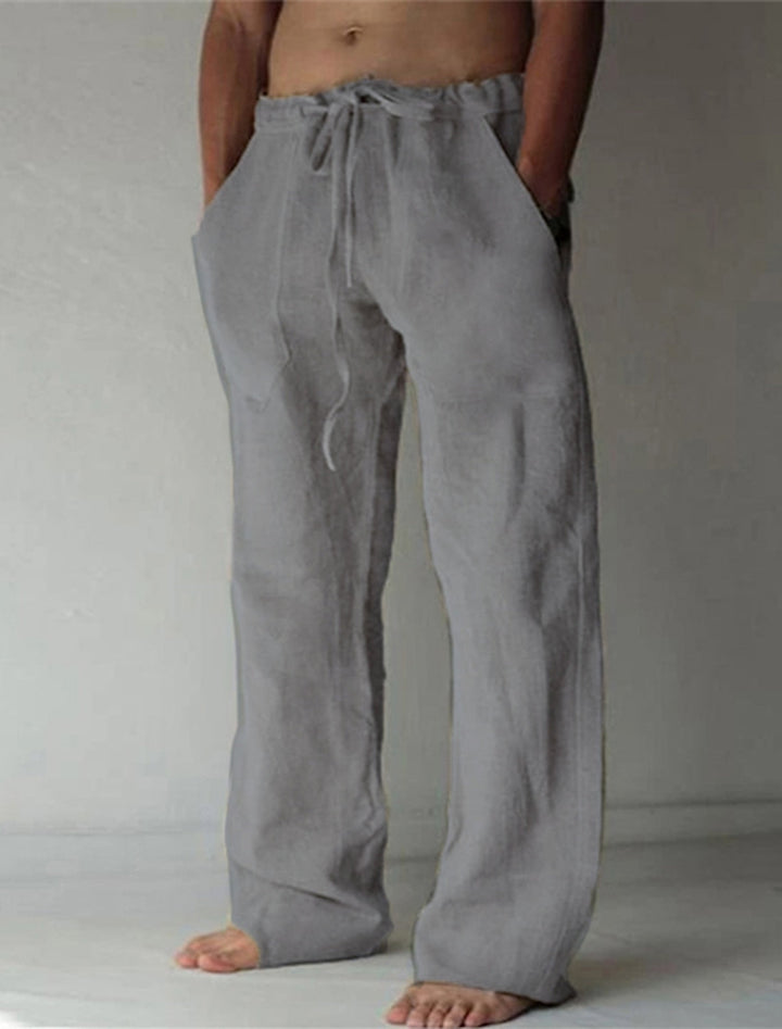 Heren Baggy Broek in Blauw, loszittend, gemaakt van lichte en ademende stof, ideaal voor zomer en vrije tijd.