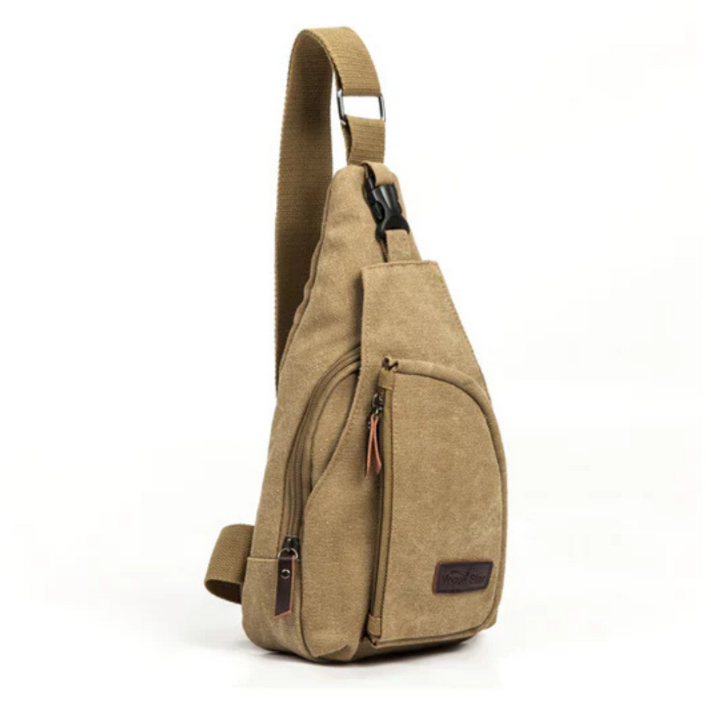 Crossbody borsttas voor mannen met verstelbare riem en ruime opbergruimte.