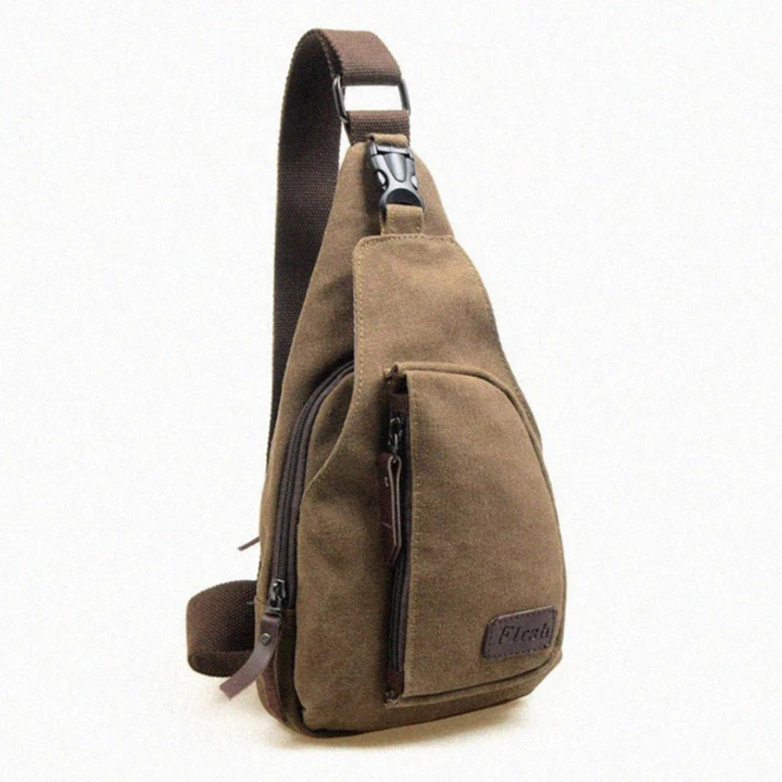 Crossbody borsttas voor mannen met verstelbare riem en ruime opbergruimte.