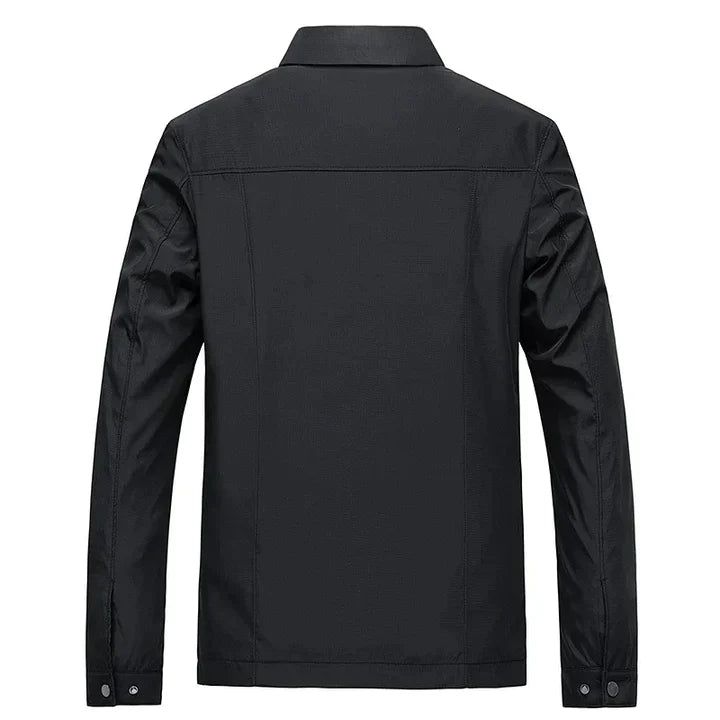 Heren lentejas in blauw, waterafstotend met moderne opstaande kraag, geschikt voor zowel zakelijke als casual looks.