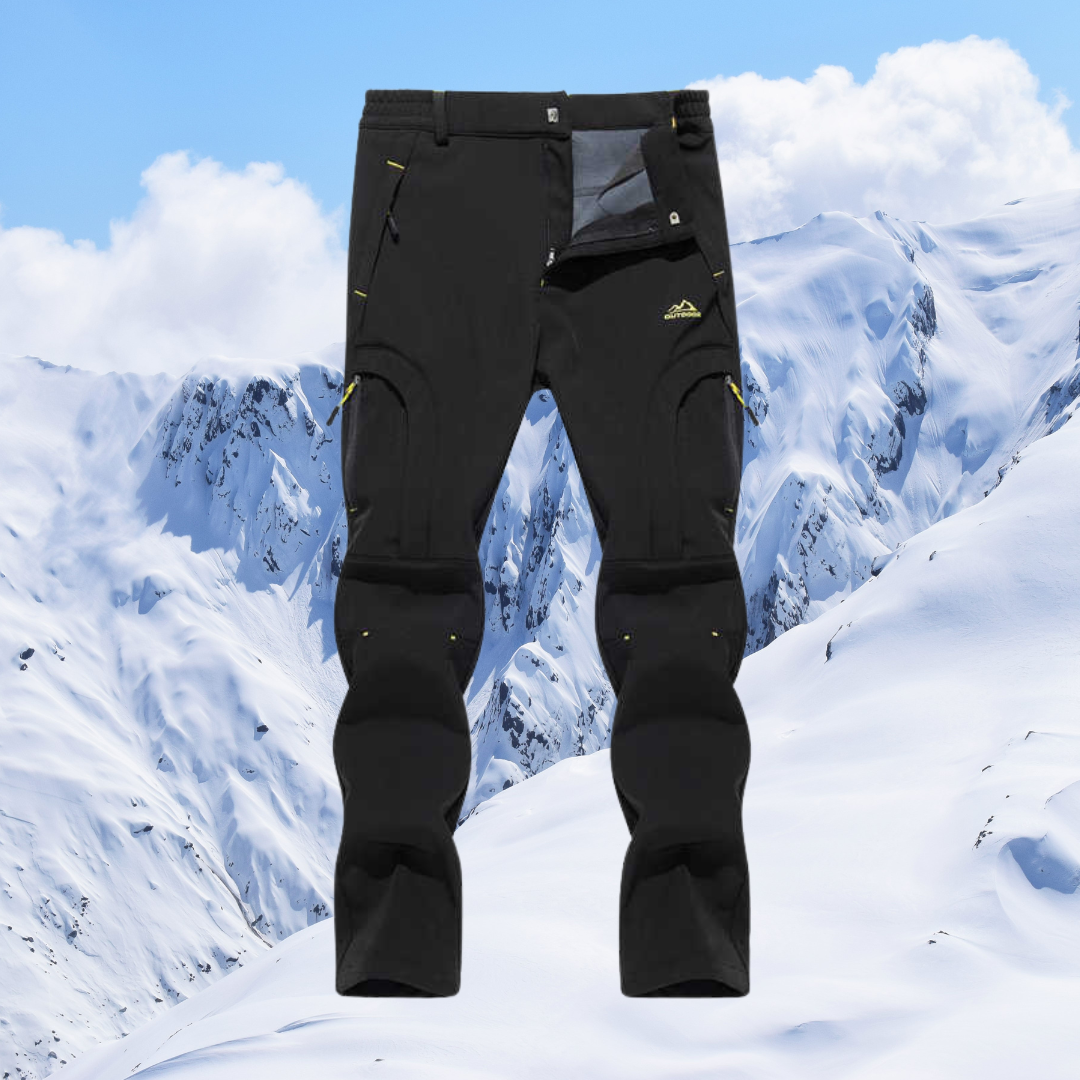 Heren thermische outdoorbroek, waterdicht, ademend, blauw, robuust, ideaal voor wandelen en kamperen, gemaakt van weerbestendig materiaal.