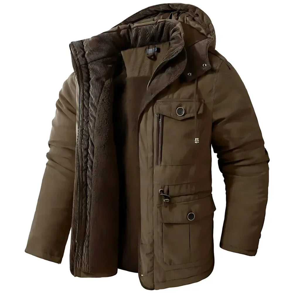 Heren winterjas, wind- en waterdicht, stijlvol in donkerblauw, ideaal voor buitenavonturen en koude winterdagen.