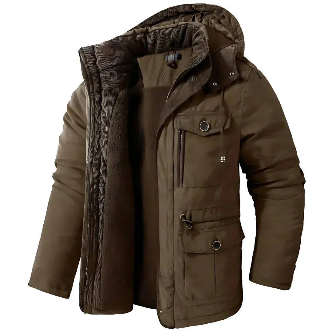 Heren winterjas, wind- en waterdicht, stijlvol in donkerblauw, ideaal voor buitenavonturen en koude winterdagen.