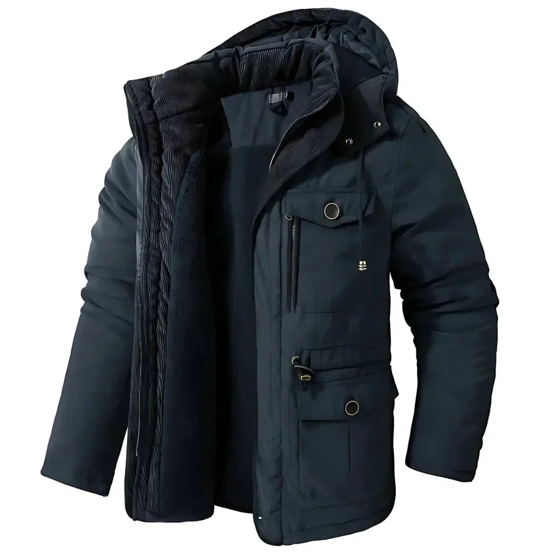 Heren winterjas, wind- en waterdicht, stijlvol in donkerblauw, ideaal voor buitenavonturen en koude winterdagen.