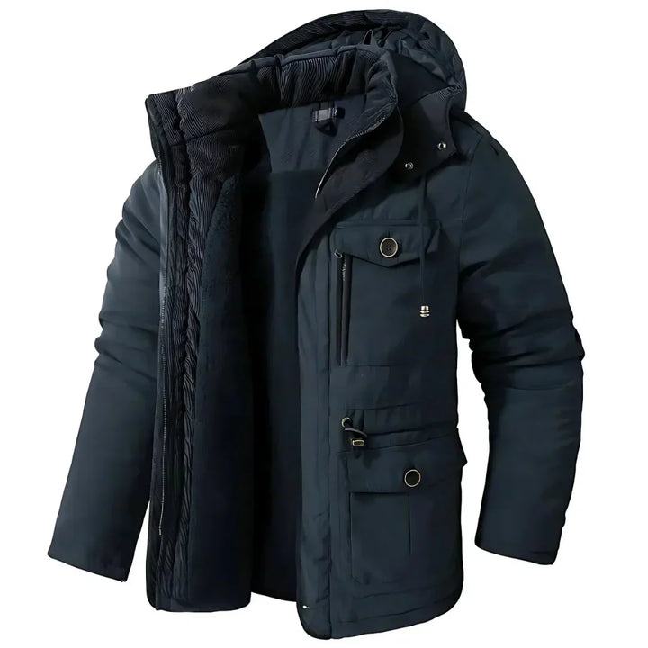 Heren winterjas, wind- en waterdicht, stijlvol in donkerblauw, ideaal voor buitenavonturen en koude winterdagen.