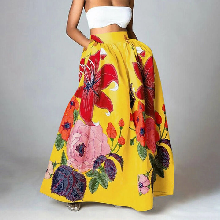 Elegante dames maxi-rok met hoge taille en bloemenprint. De rok is lang en golvend voor een vrouwelijke zomerlook.