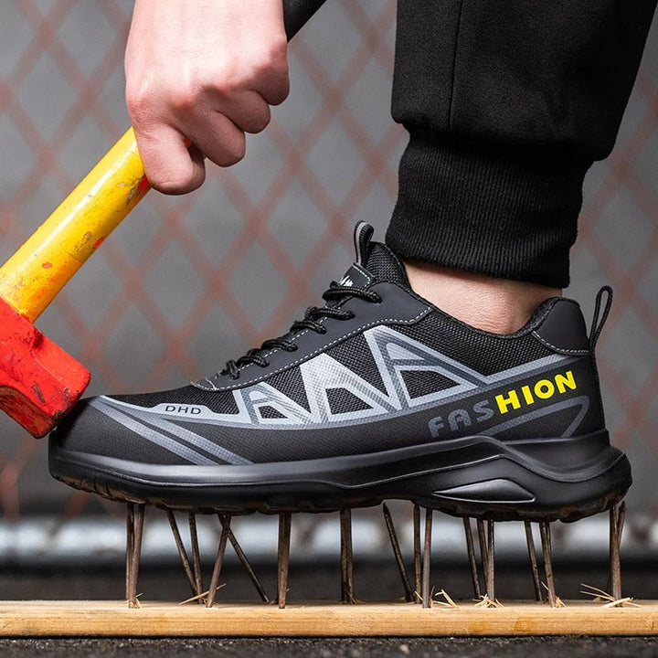 Stevige heren safety sneakers met ruime stalen neus, antislipfunctie en robuuste lederen constructie.