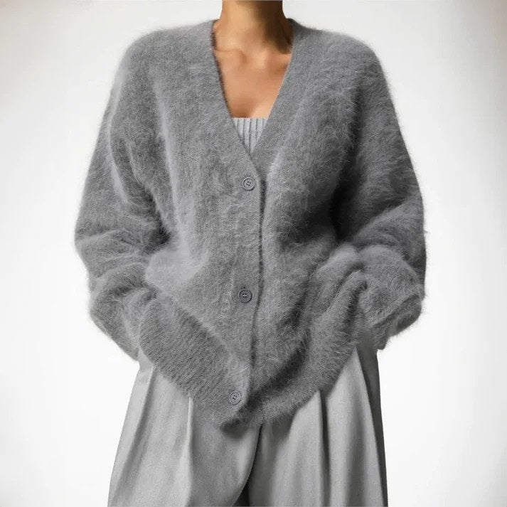 Stijlvolle dames kasjmier cardigan in grijs, zacht en comfortabel, ideaal voor diverse gelegenheden.