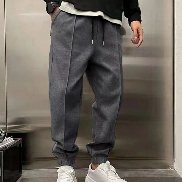 Klassieke heren joggingbroek van katoen, met elastische tailleband en zijzakken, ideaal voor sport en vrije tijd, comfortabel en veelzijdig