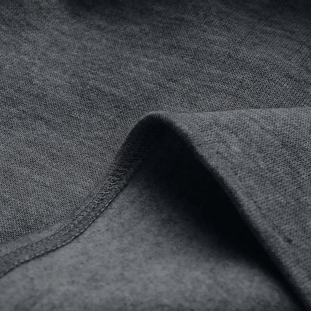 Klassieke herenblazer in tijdloos design, donkergrijs, met elegante pasvorm, perfect voor formele en informele gelegenheden.