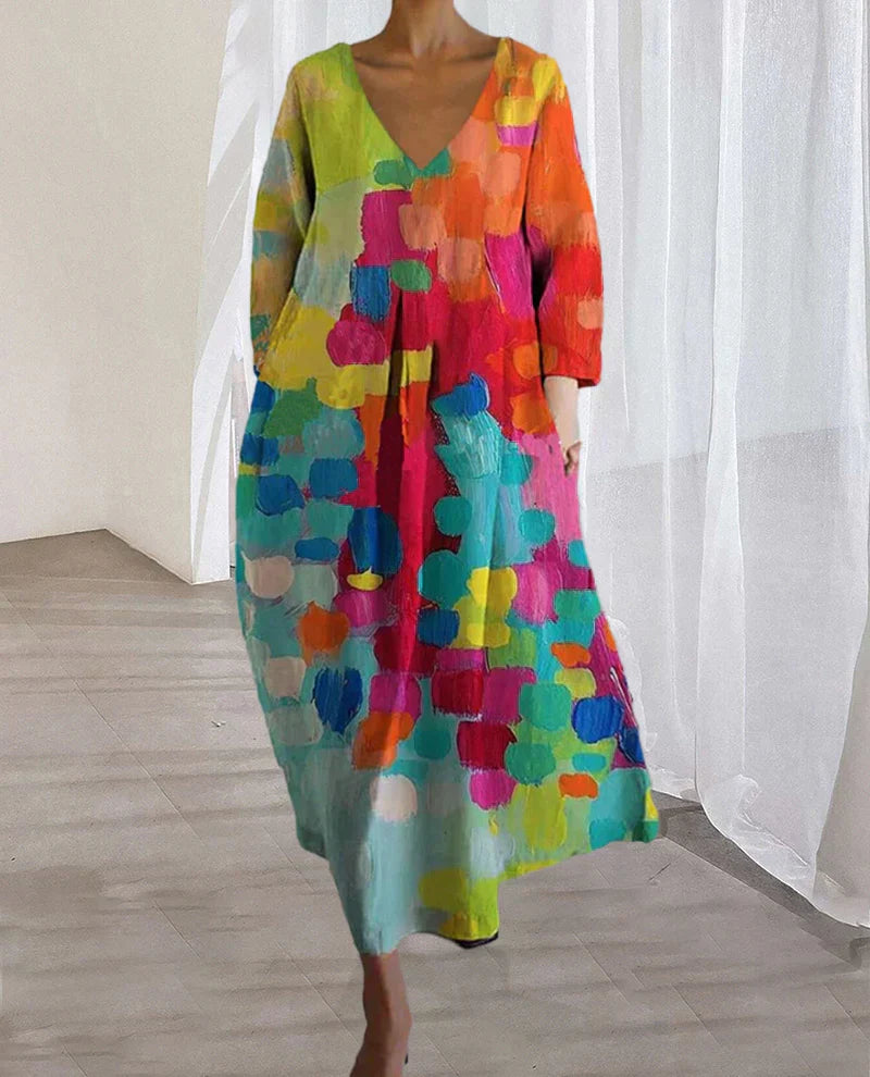 Dames lente/zomer jurk met levendige print, vrouwelijke V-hals. Comfortabele en elegante nieuwe collectie.