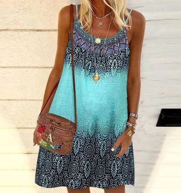 Kleurrijke dames zomerjurk SunnyDress™ met unieke print, ideaal voor strand of casual mode.