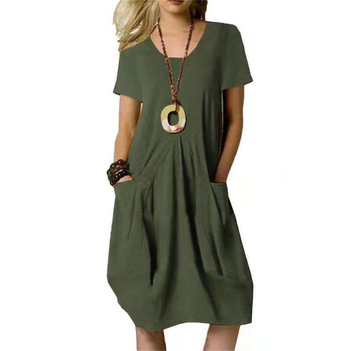 Antje dames knielange lichte zomerjurk in oranjerode kleur, ideaal voor ontspannen dagen, met een elegante en veelzijdige silhouet.