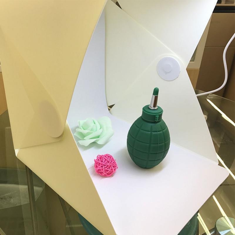 Compacte fotostudio lichtbox met LED-licht, witte achtergrond en draagtas voor hoogwaardige huisfotografie