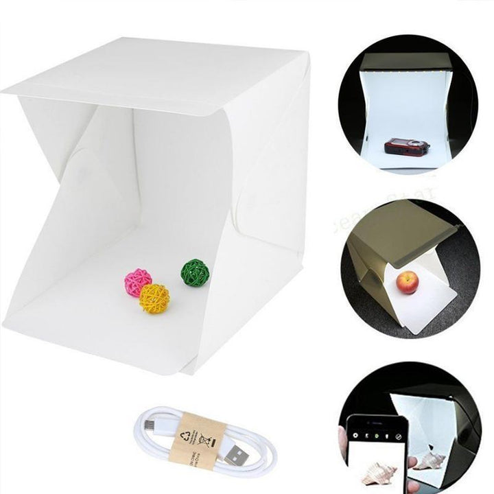 Compacte fotostudio lichtbox met LED-licht, witte achtergrond en draagtas voor hoogwaardige huisfotografie