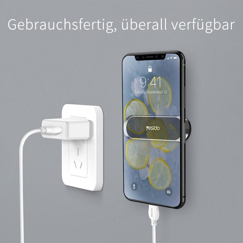 Compacte magnetische telefoonhouder op dashboard, montagevrij, sterke magneetkracht voor veilige smartphonebevestiging.