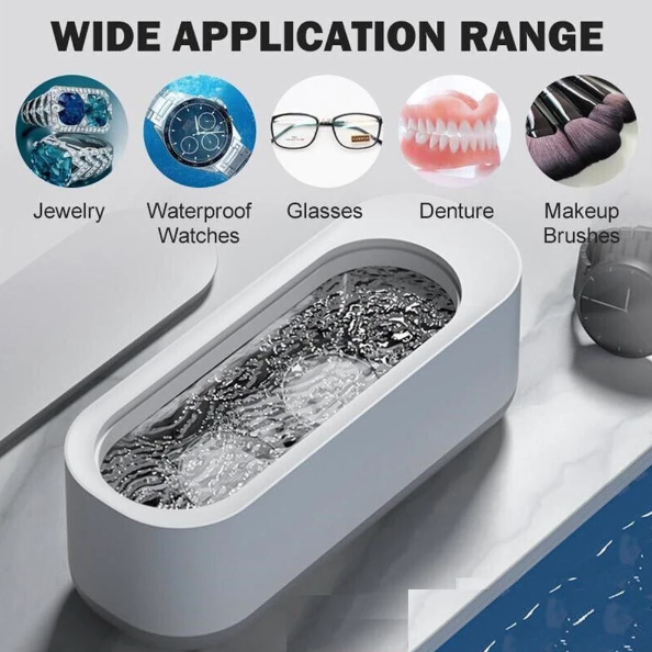 Compacte witte ultrasoonreiniger, ideaal voor 360° reiniging van sieraden en brillen; efficiënte technologie voor thuis.