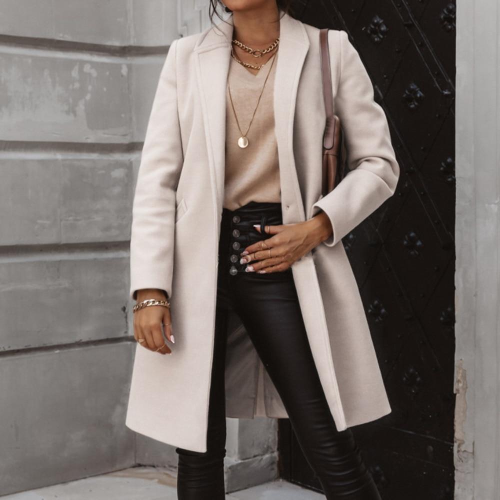 Comfortabele lange dames winterjas van luxe kasjmier, ideaal voor koude dagen en elegante mode.
