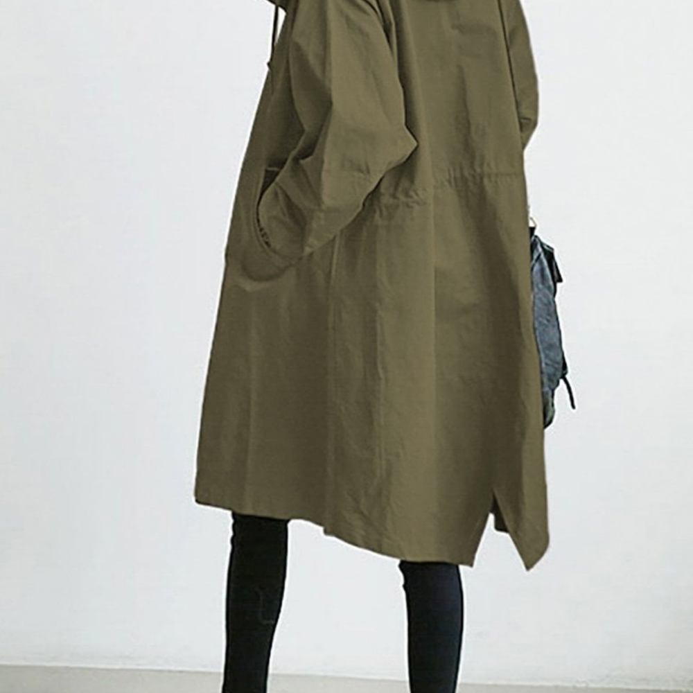 Lange, elegante dames trenchcoat, waterdicht, met een stijlvolle pasvorm in beige. Ideaal voor wintermode en slecht weer.