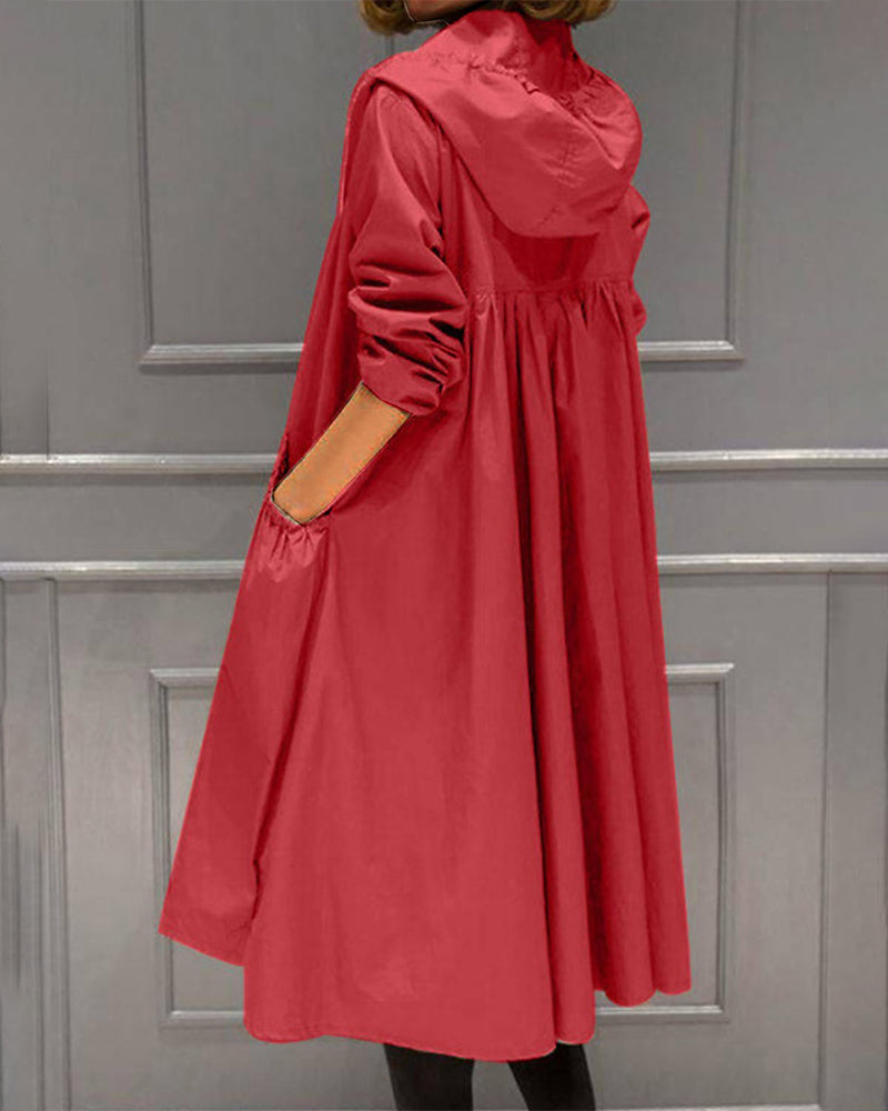 Dames lange waterdichte regenjas met capuchon, detail van de stof